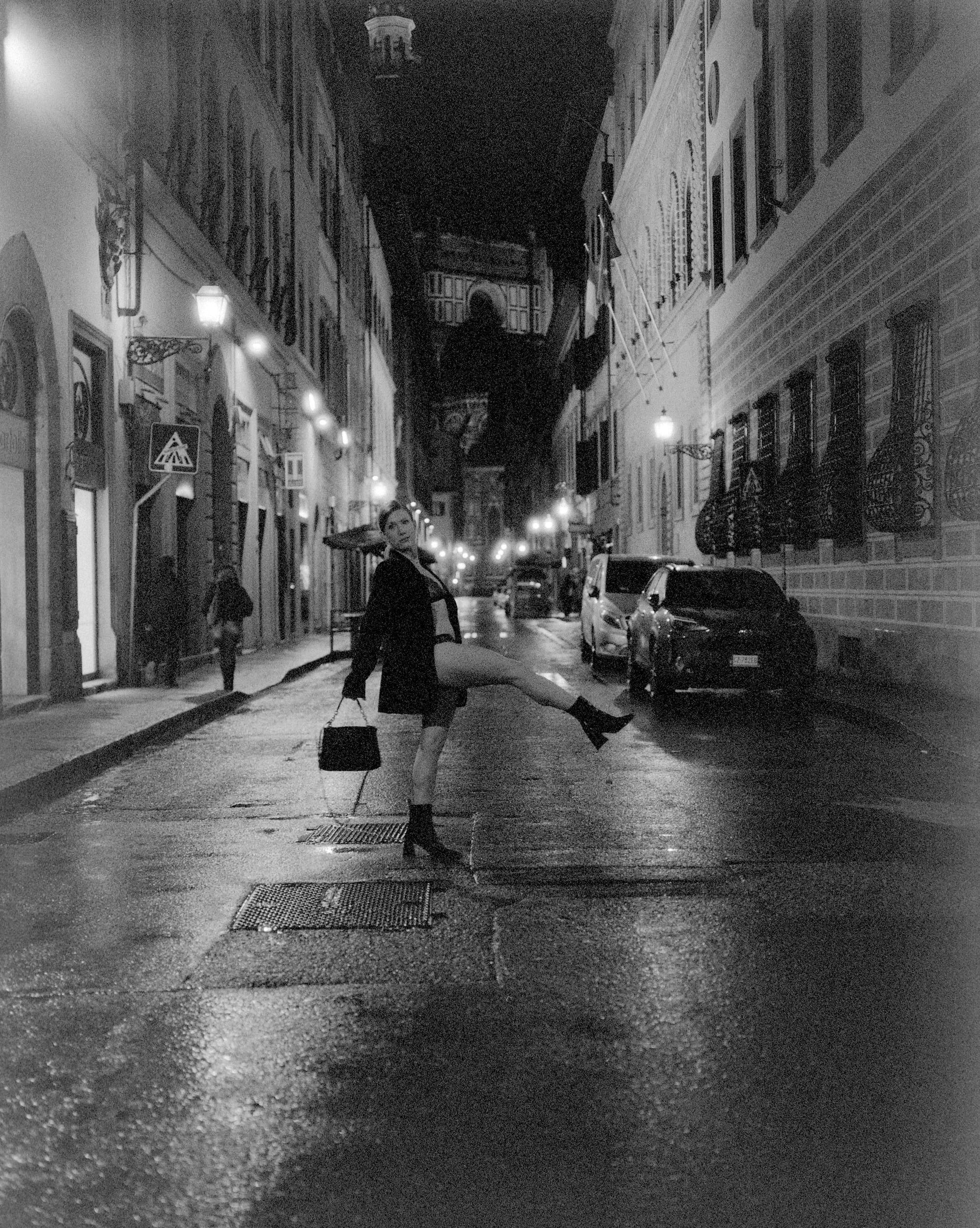 Black and white analog photograph shot on Mamiya RZ67 Pro II and Ilford Delta 3200 Professional in Florence, Italy by TheAnalogPhotographer (United States). [Fashion]