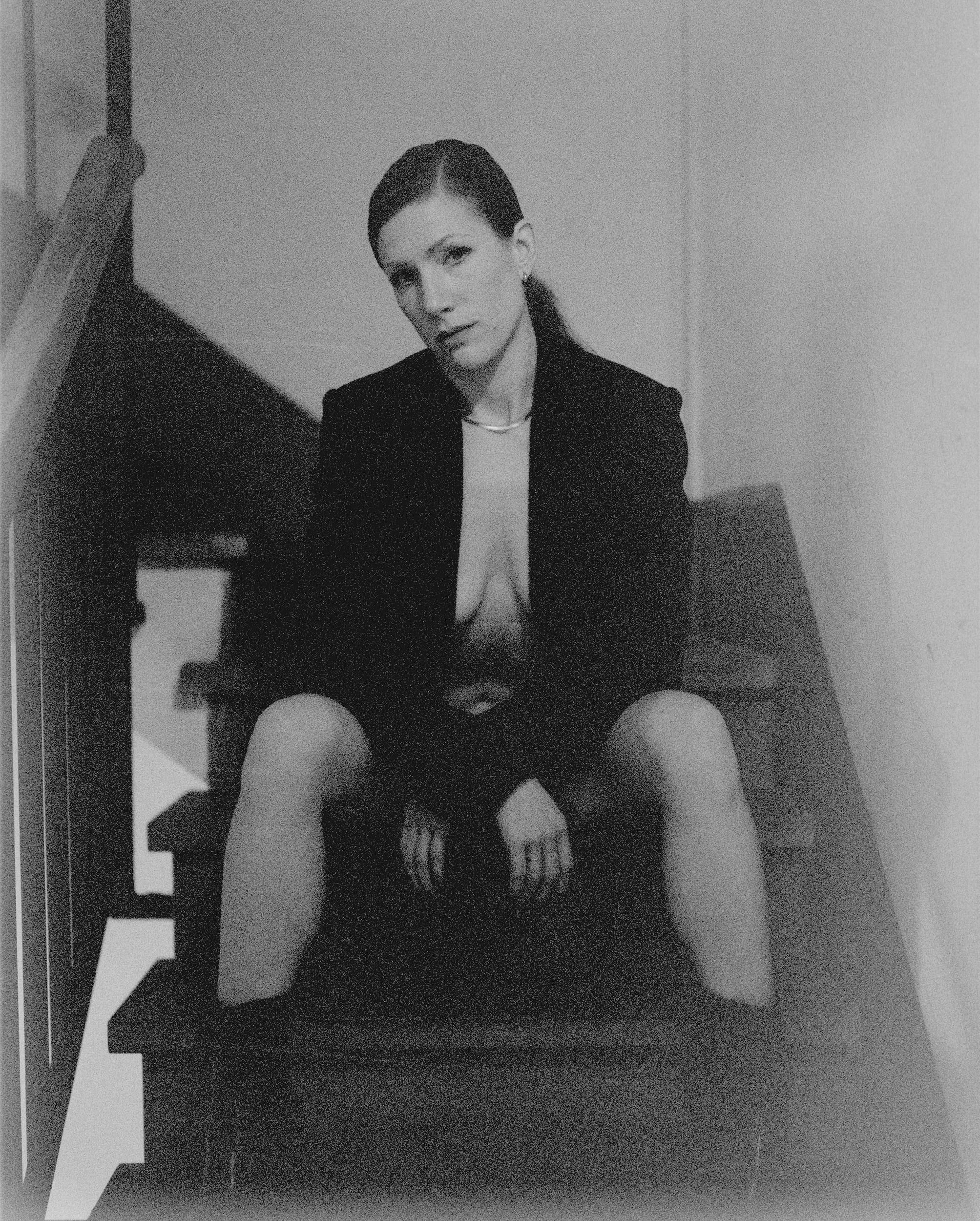 Black and white analog photograph shot on Mamiya RZ67 Pro II and Ilford Delta 3200 Professional in Florence, Italy by TheAnalogPhotographer (United States). [Fashion]
