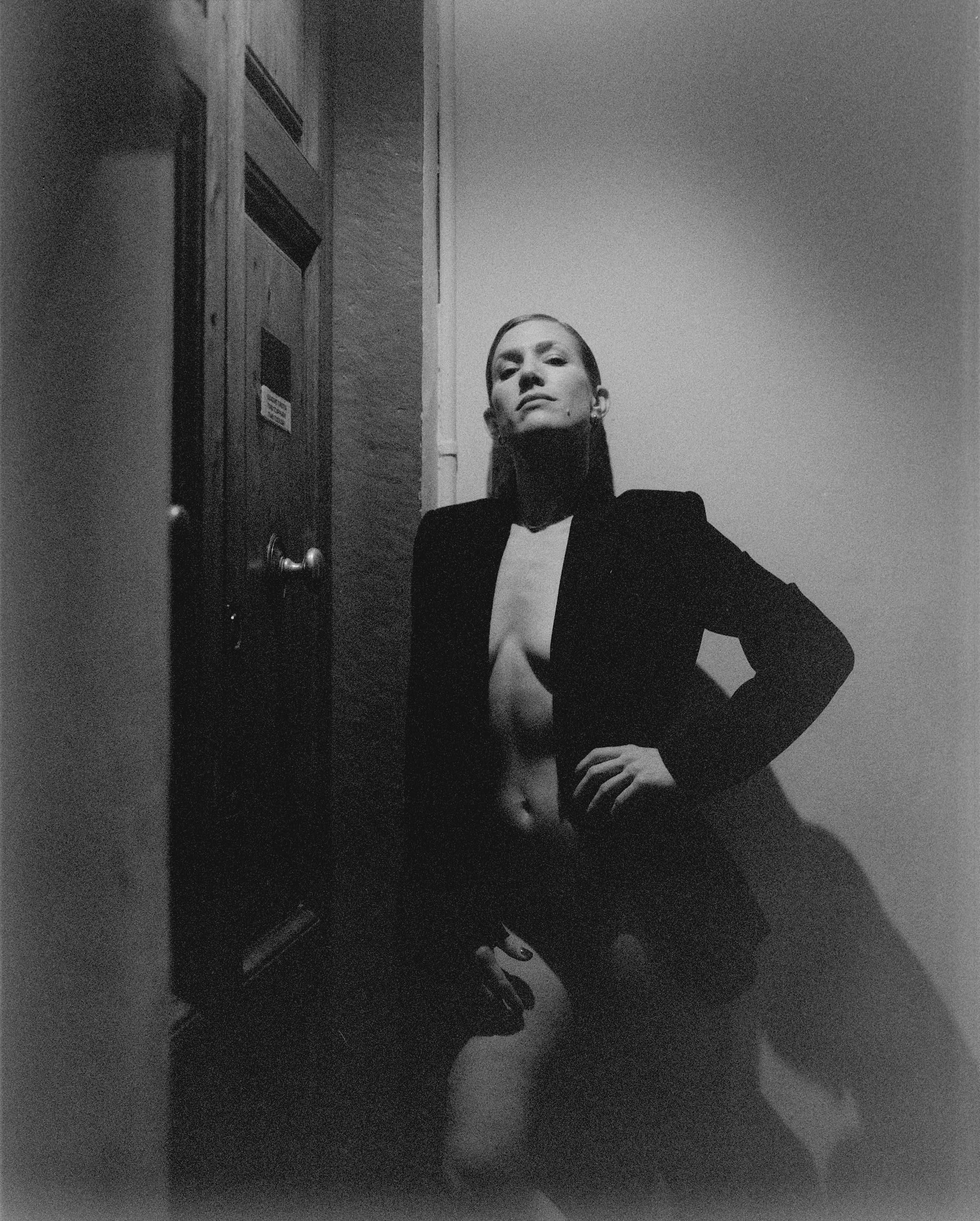 Black and white analog photograph shot on Mamiya RZ67 Pro II and Ilford Delta 3200 Professional in Florence, Italy by TheAnalogPhotographer (United States). [Fashion]