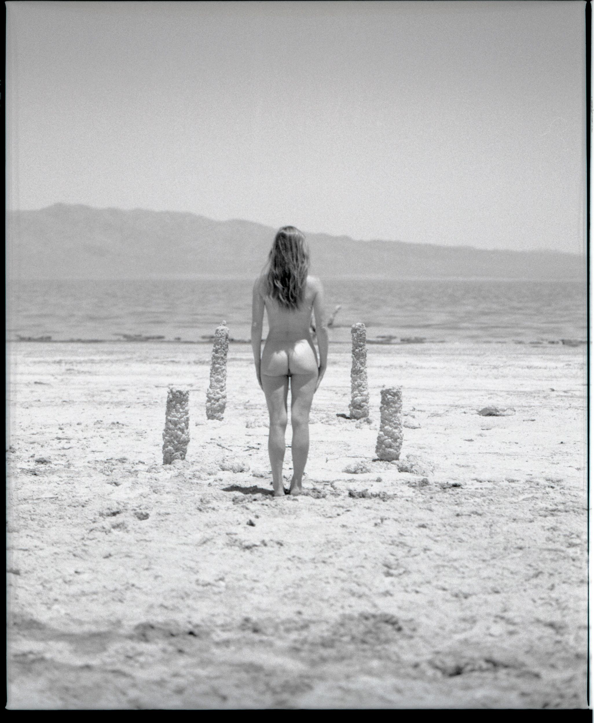 Black and white analog photograph shot on Mamiya RZ67 Pro II and Ilford Delta 400 Professional with Sekor 180mm by TheAnalogPhotographer (United States). [Art Nude (NSFW)]