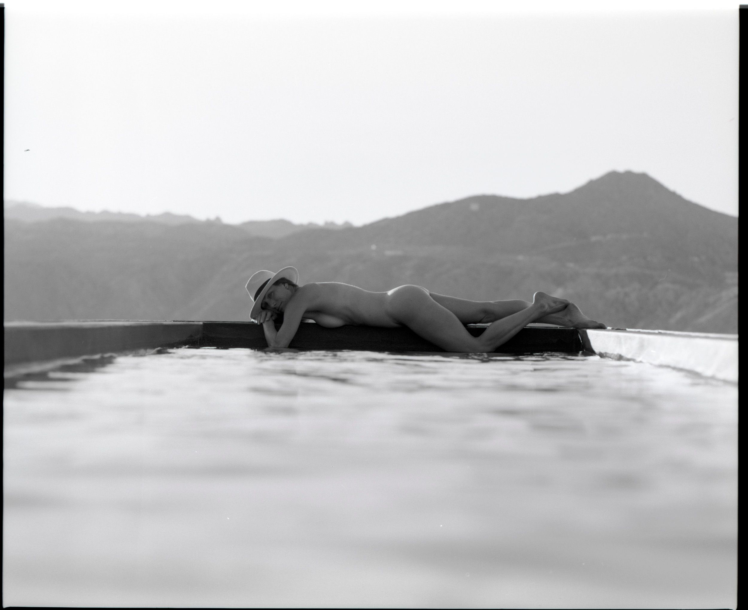 Black and white analog photograph shot on Mamiya RZ67 Pro II and Ilford Delta 400 Professional with Sekor 90mm in Joshua Tree, CA by TheAnalogPhotographer (United States). [Art Nude (NSFW)]