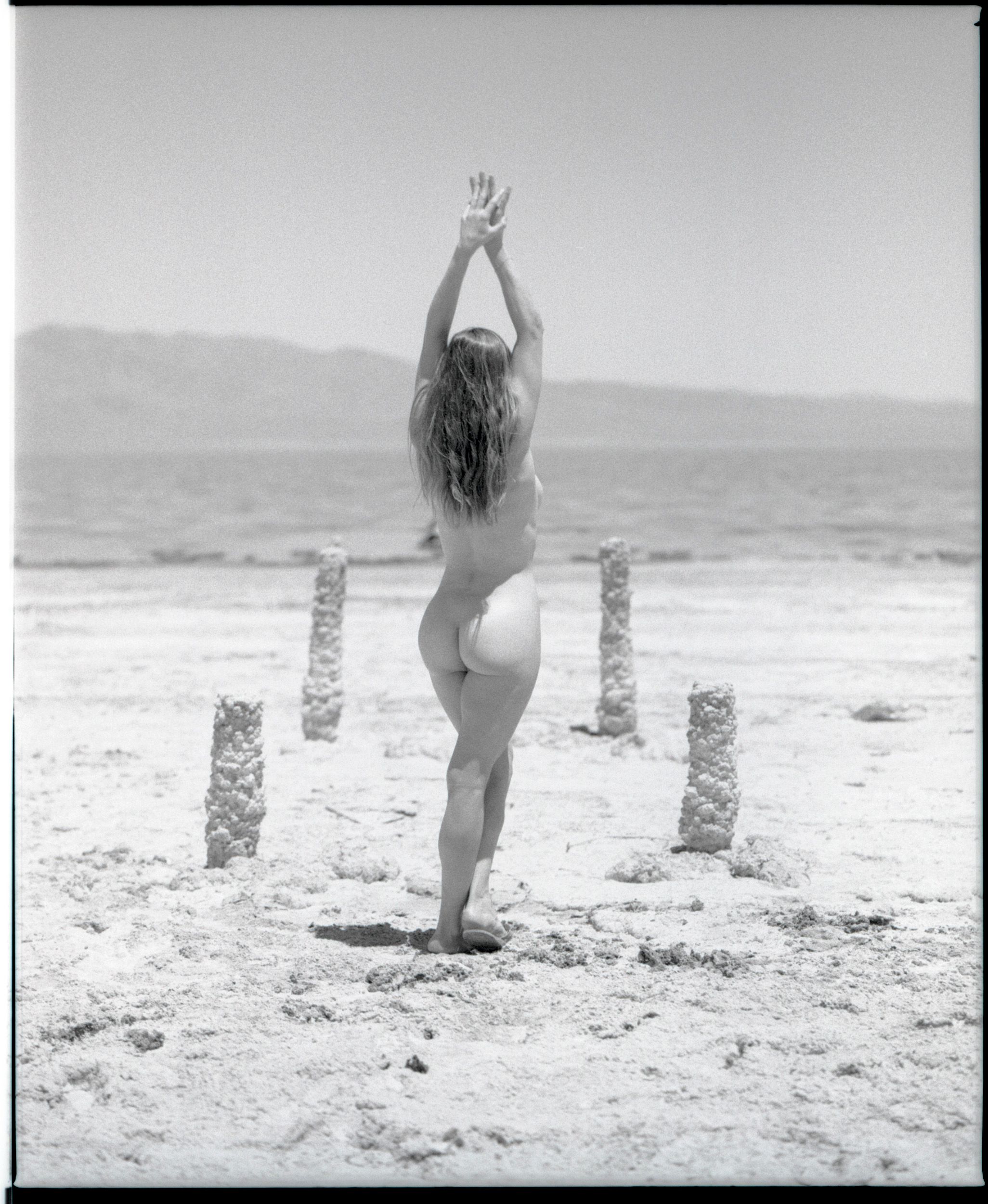 Black and white analog photograph shot on Mamiya RZ67 Pro II and Ilford Delta 400 Professional with Sekor 180mm by TheAnalogPhotographer (United States). [Art Nude (NSFW)]