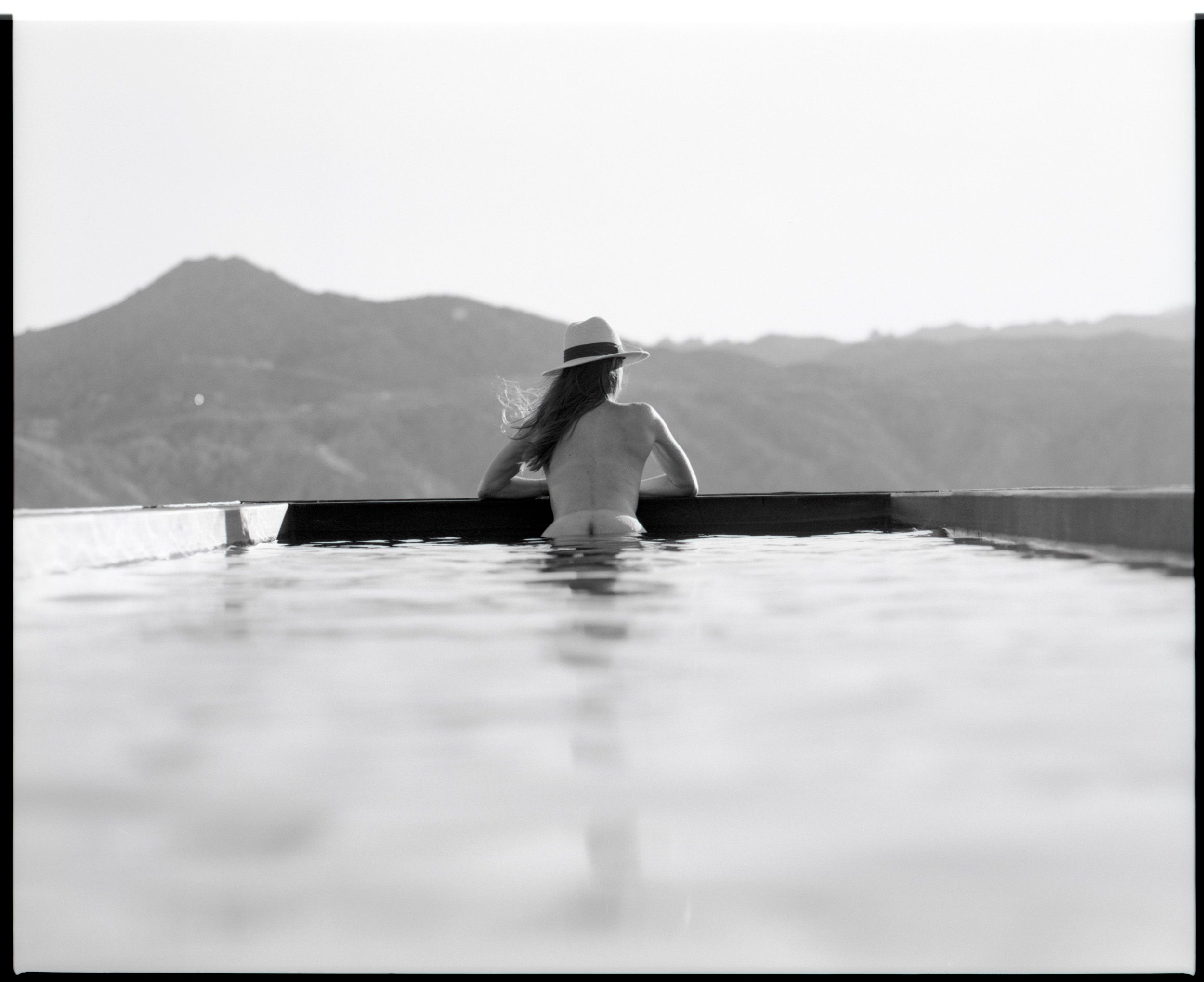 Black and white analog photograph shot on Mamiya RZ67 Pro II and Ilford Delta 400 Professional with Sekor 90mm in Joshua Tree, CA by TheAnalogPhotographer (United States). [Art Nude (NSFW)]
