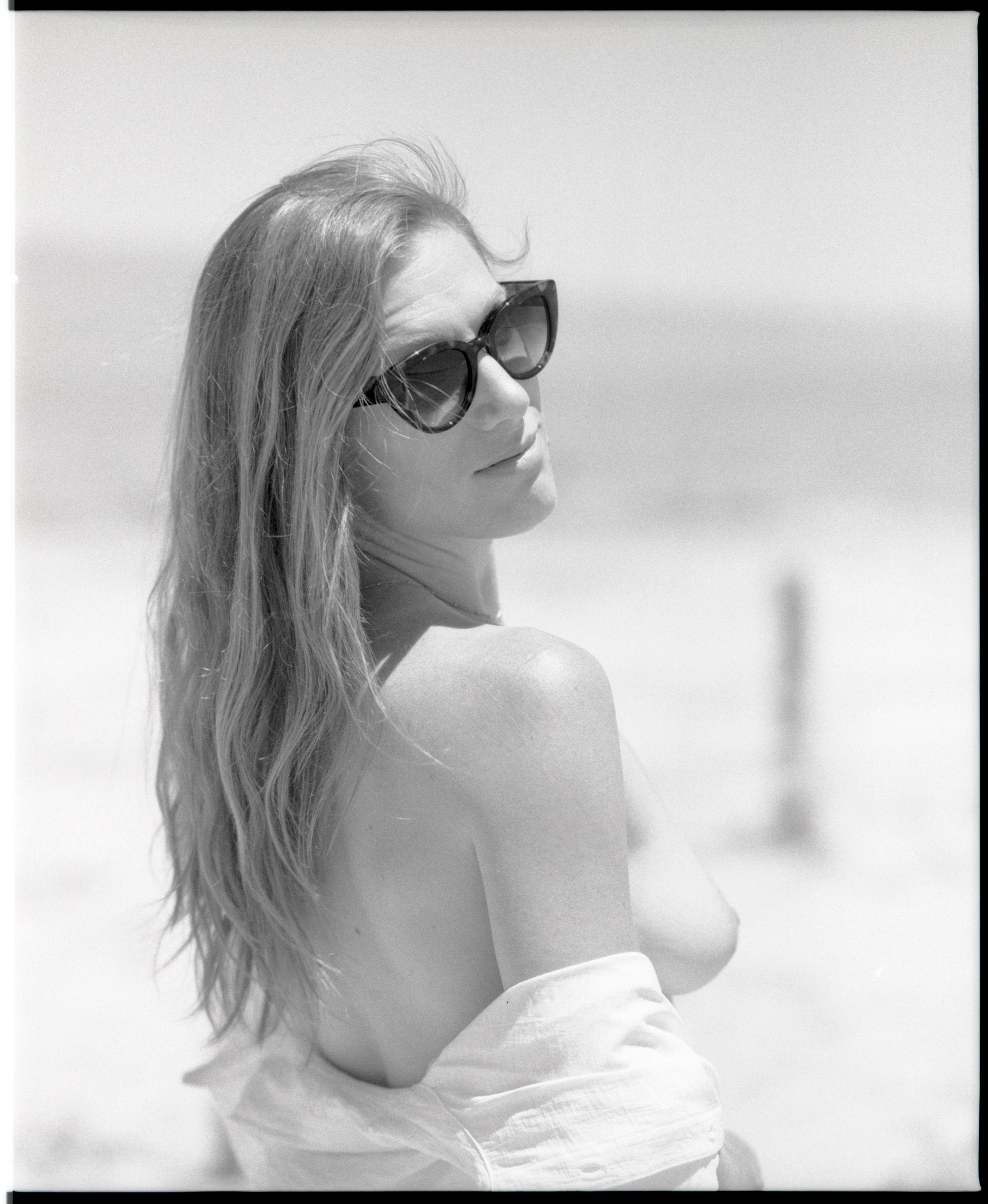 Black and white analog photograph shot on Mamiya RZ67 Pro II and Ilford Delta 400 Professional with Sekor 180mm by TheAnalogPhotographer (United States). [Art Nude (NSFW)]