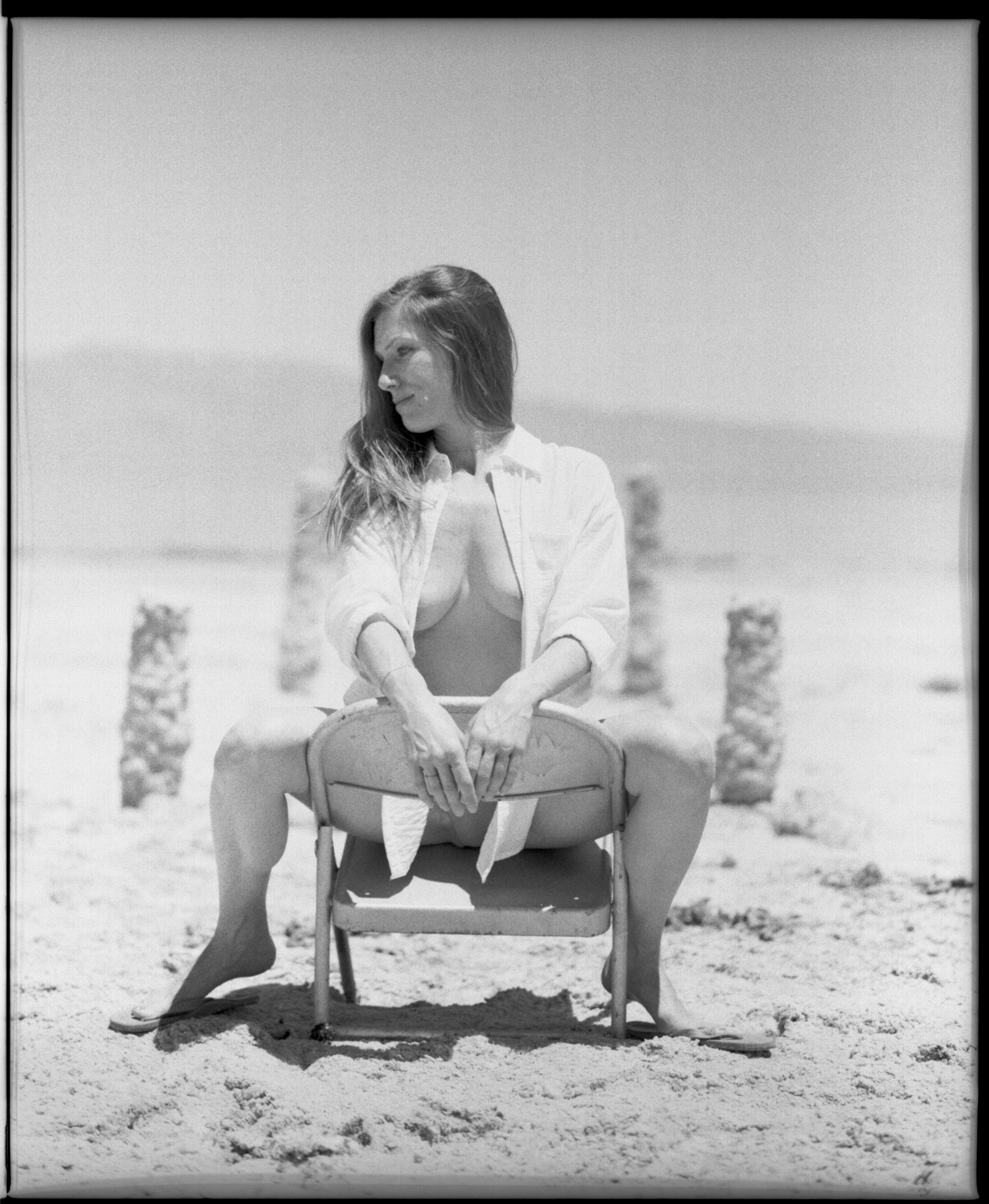 Black and white analog photograph shot on Mamiya RZ67 Pro II and Ilford Delta 400 Professional with Sekor 180mm by TheAnalogPhotographer (United States). [Art Nude (NSFW)]