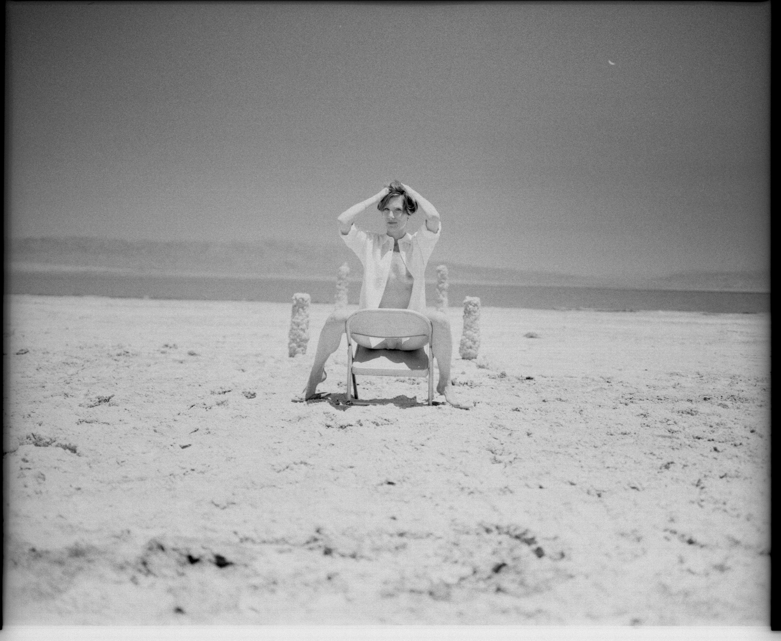 Black and white analog photograph shot on Mamiya RZ67 Pro II and Ilford Delta 400 Professional with Sekor 90mm by TheAnalogPhotographer (United States). [Art Nude (NSFW)]