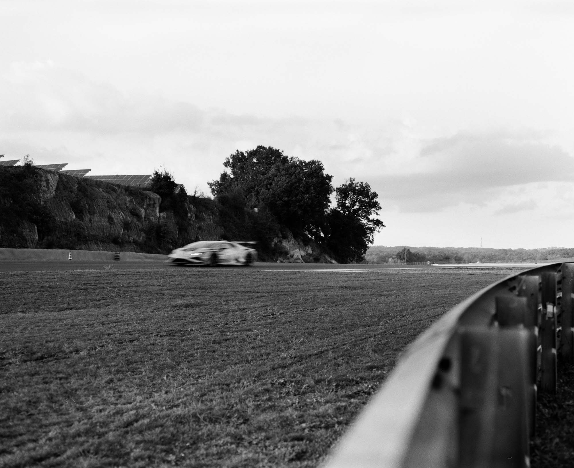 Black and white analog photograph shot on Mamiya RZ67 Pro II and Ilford Hp5 Plus in Italy by TheAnalogPhotographer (United States). [Automotive]