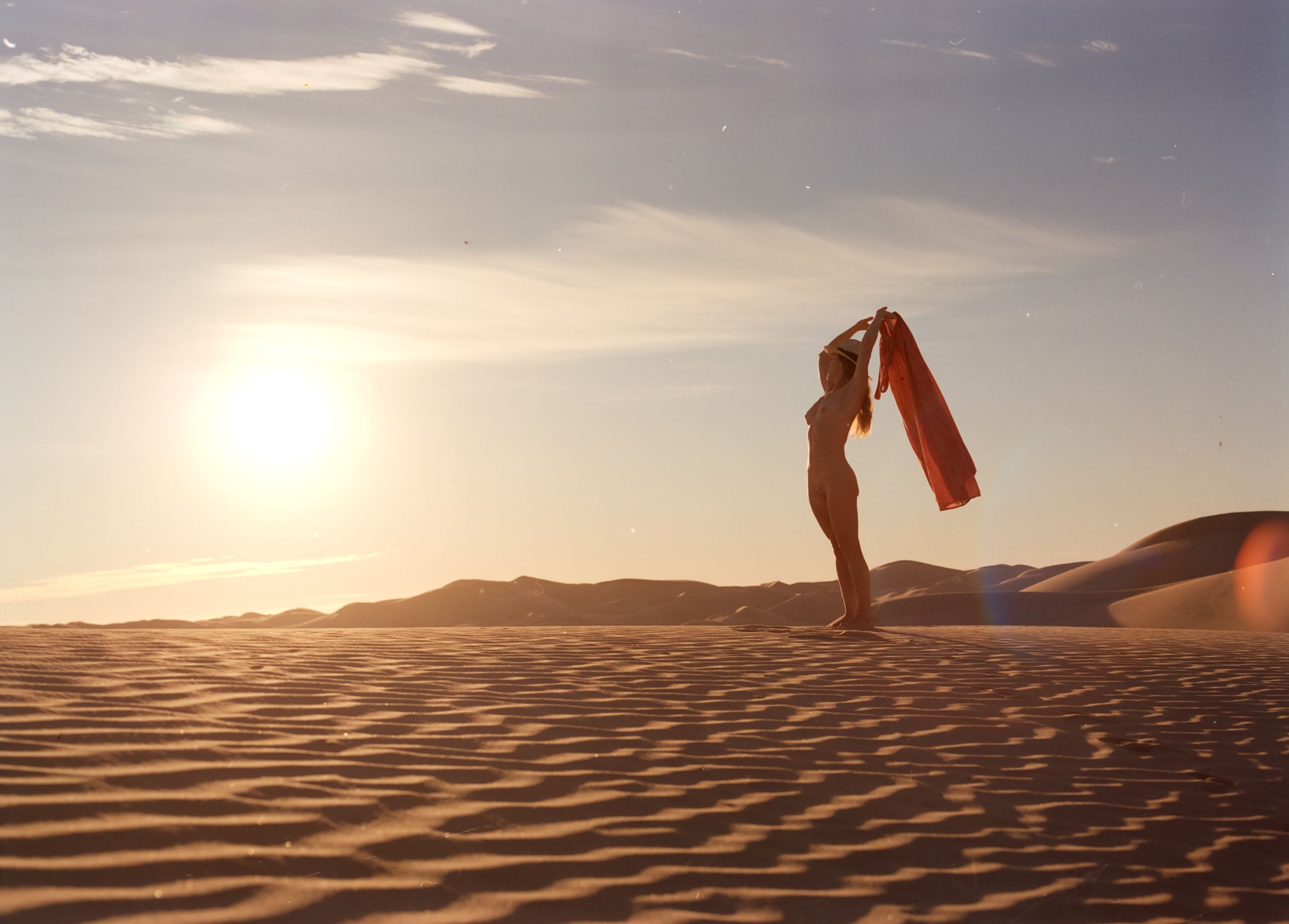 Color analog photograph shot on Mamiya RZ67 Pro II and Kodak Vision3 250D with Sekor 50mm f4.5 in Imperial Sand Dunes by TheAnalogPhotographer (United States). [Art Nude (NSFW)]