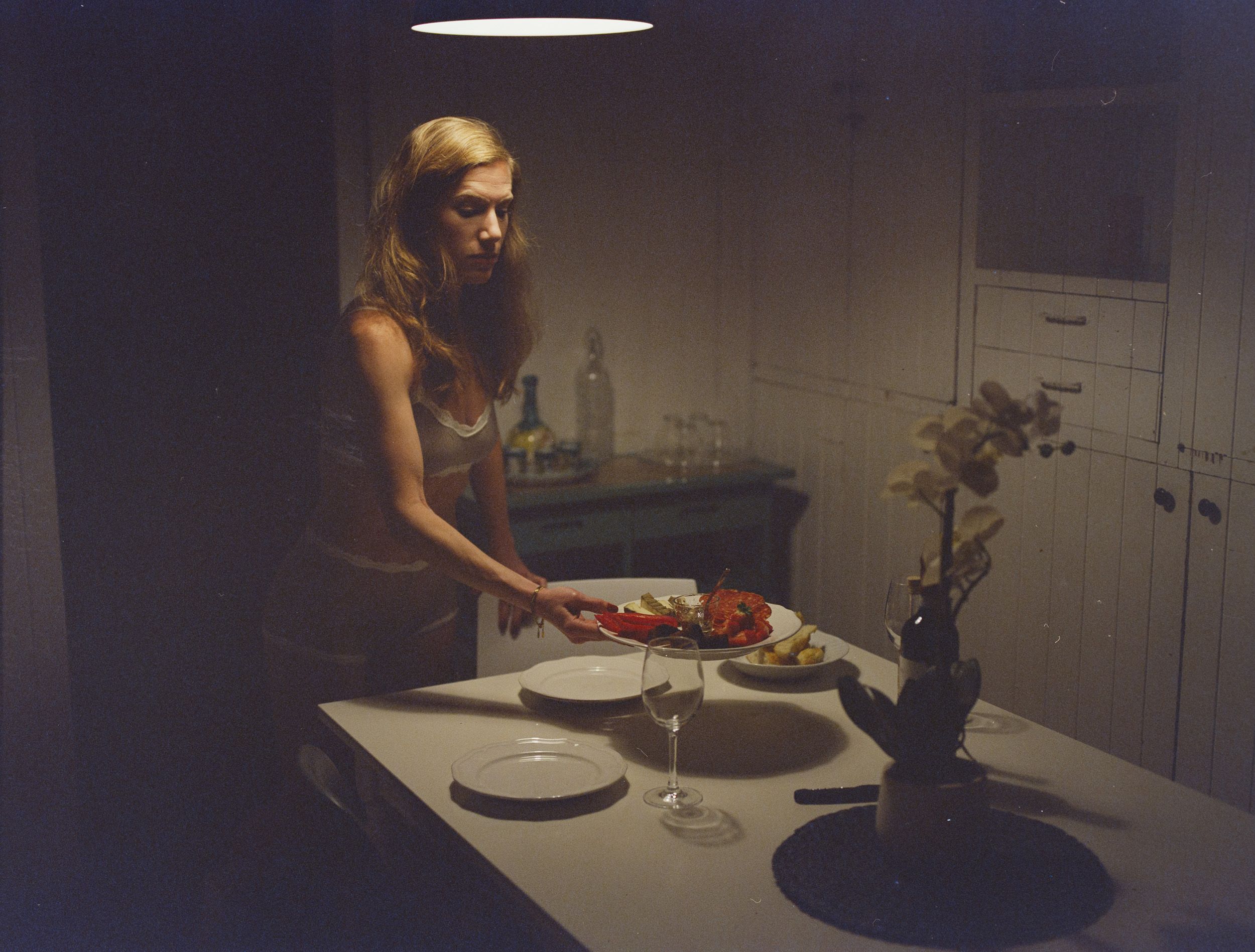 Color analog photograph shot on Mamiya RZ67 Pro II and Kodak Vision3 500T with Sekor 90mm in Florence, Italy by TheAnalogPhotographer (United States). [Boudoir (SFW)]