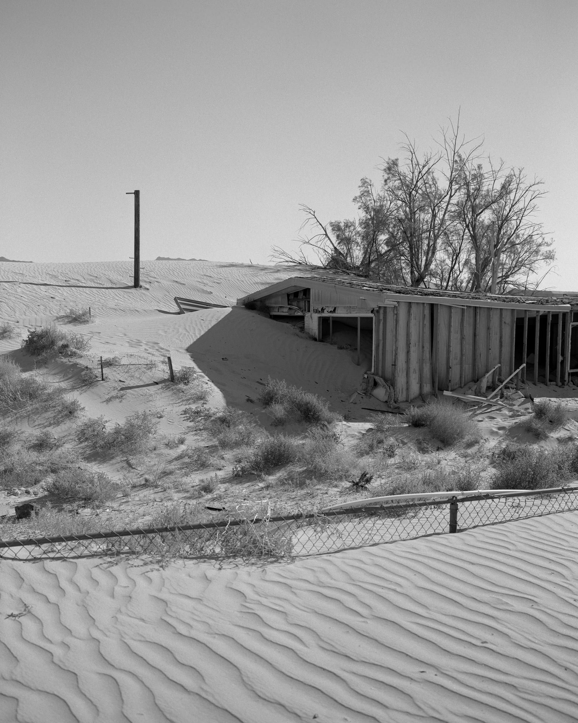 Black and white analog photograph shot on Mamiya 7ii and Kodak Professional T-Max 400 with 80mm f4 in Newberry Springs, California by Jack_von_Linden (United States). [Landscape]