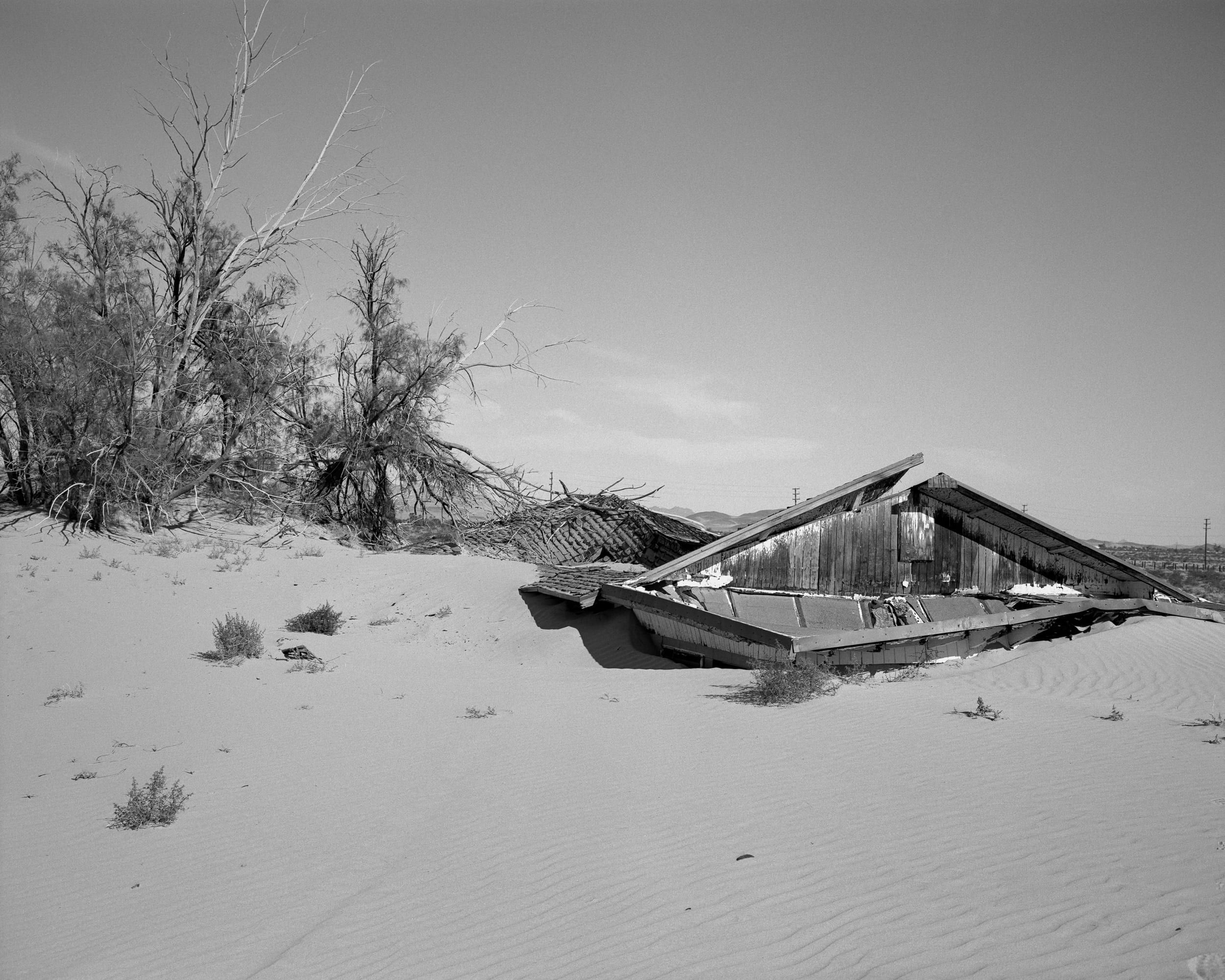 Black and white analog photograph shot on Mamiya 7ii and Kodak Professional T-Max 400 with 80mm f4 in Newberry Springs, California by Jack_von_Linden (United States). [Landscape]