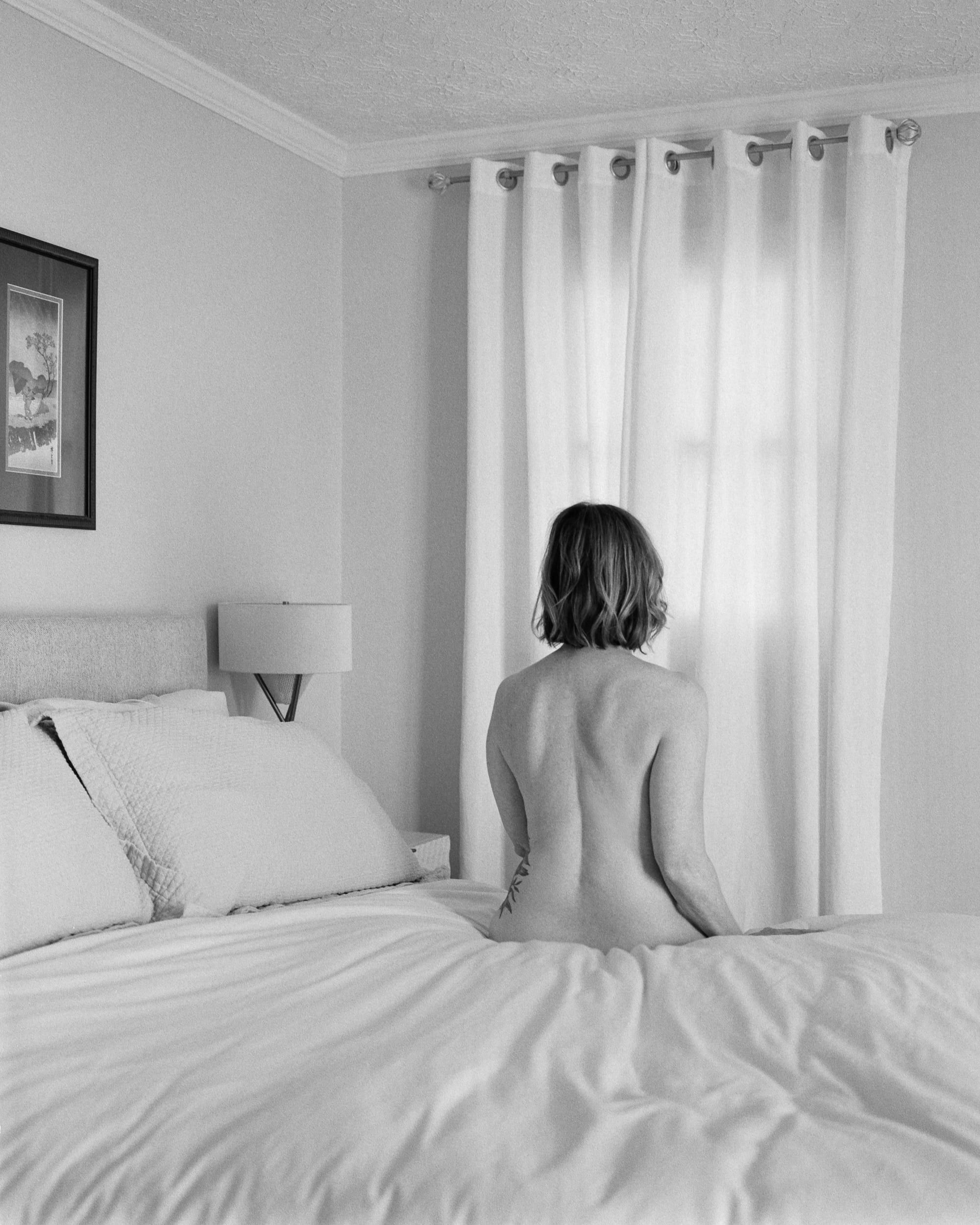 Black and white analog photograph shot on Mamiya 7ii and Ilford Hp5 Plus with 80mm f4 in Columbus, Ohio by Jack_von_Linden (United States). [Boudoir (NSFW)]