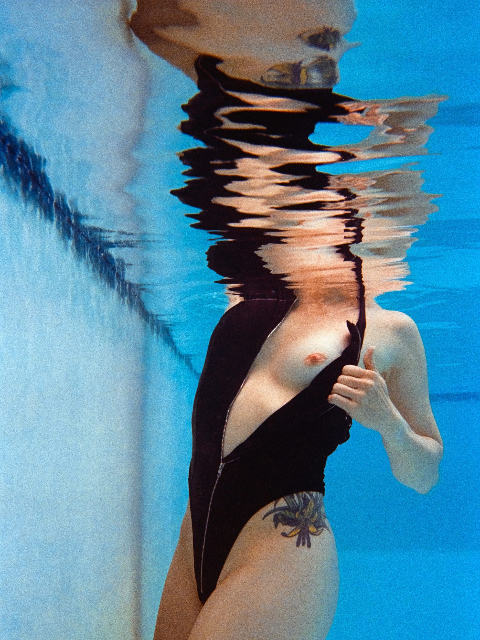 Color analog photograph shot on Nikonos V and Kodak Professional Portra 800 with 35mm f2.5 in Columbus, Ohio by Jack_von_Linden (United States). [Underwater]
