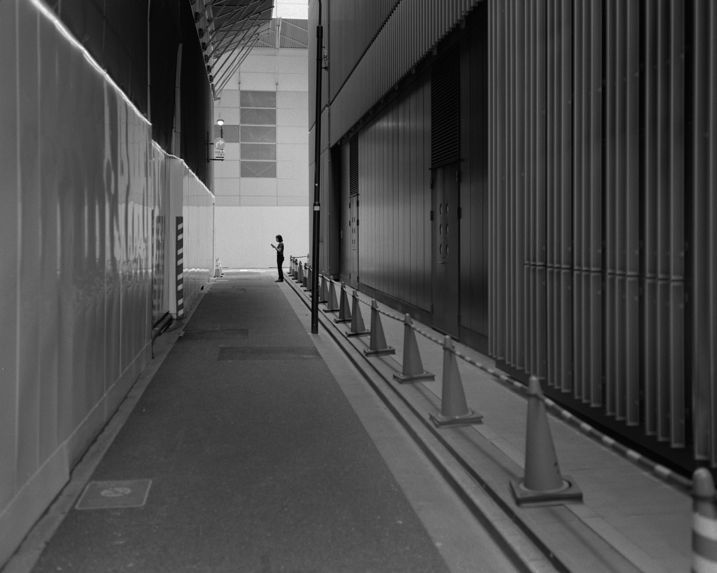 Black and white analog photograph shot on Plaubel Makina 670 and Ilford Hp5 Plus with Nikkor 80mm f2.8 (fixed) in Tokyo, Japan by Jack_von_Linden (United States). [Editorial]