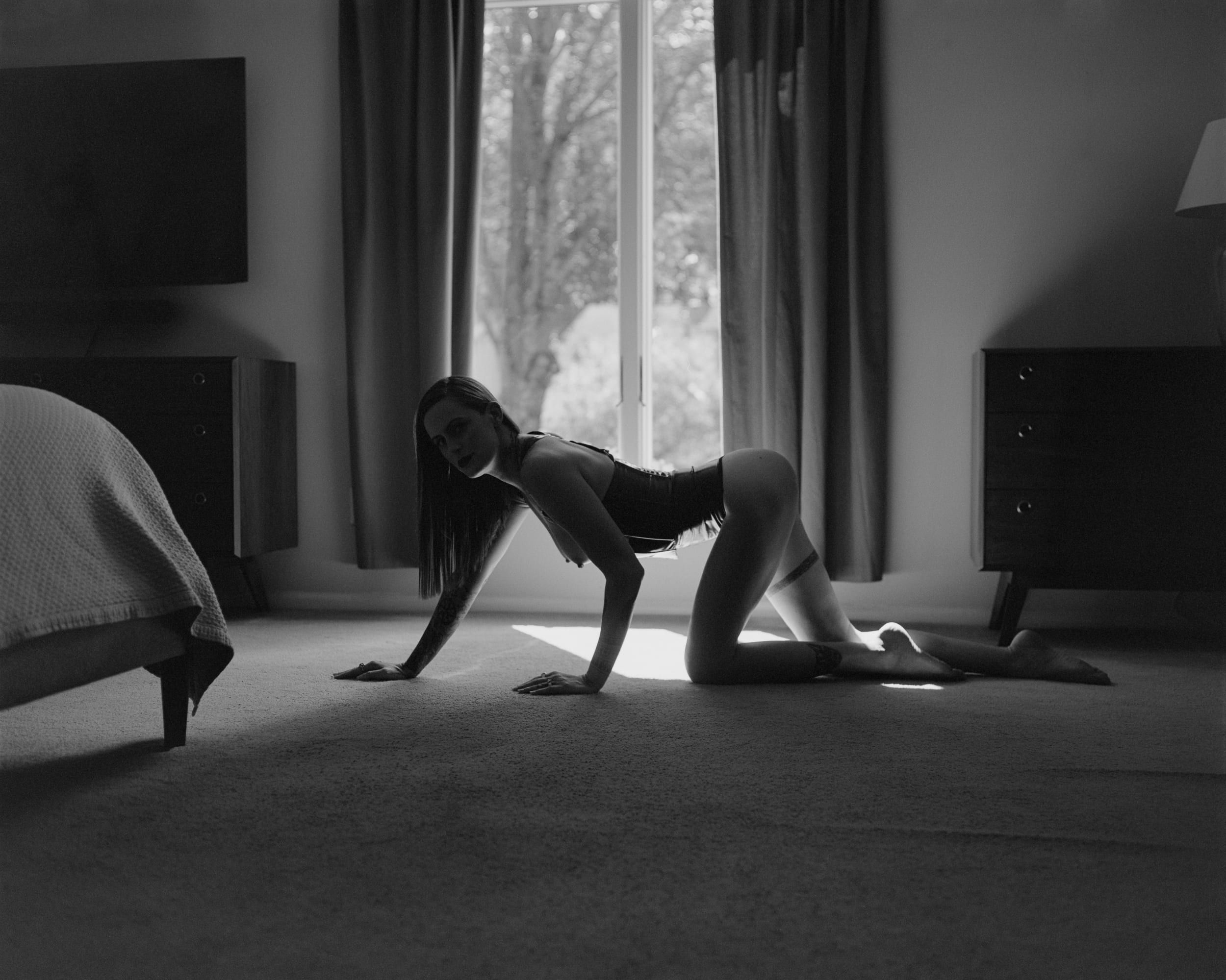 Black and white analog photograph shot on Plaubel Makina 670 and Kodak Professional T-Max 400 with Nikkor 80mm f2.8 (fixed) in Columbus, Ohio by Jack_von_Linden (United States). [Boudoir (NSFW)]
