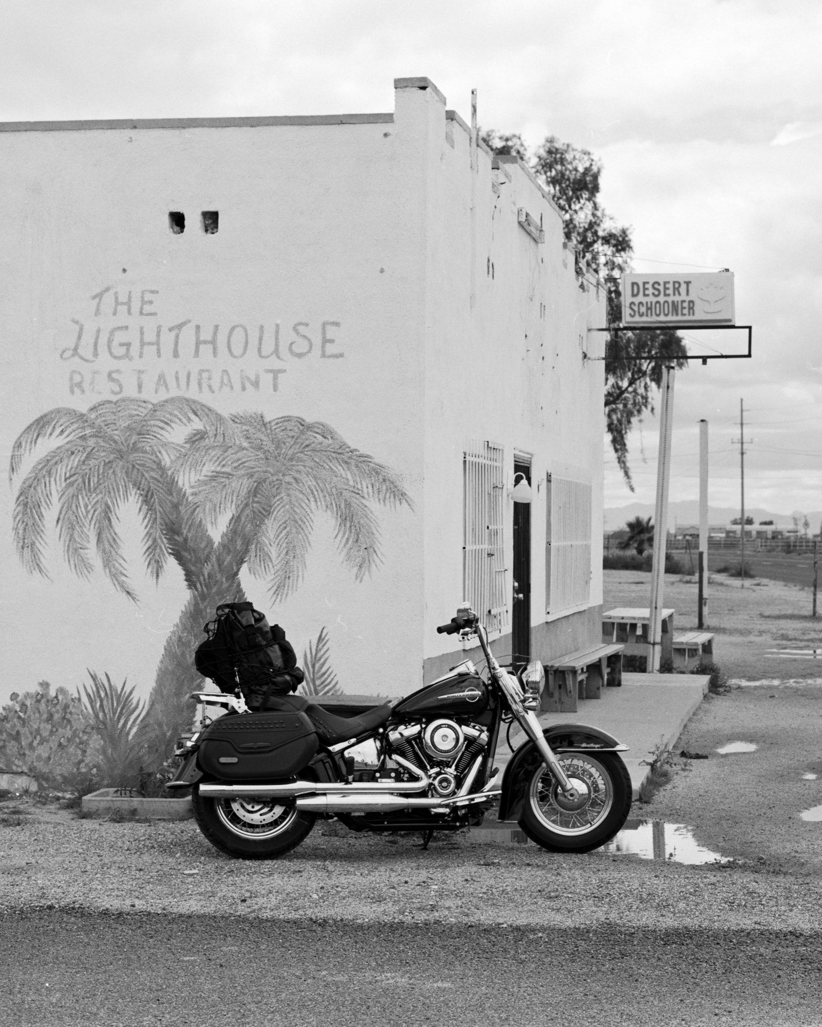 Black and white analog photograph shot on Pentax 6x7 and Ilford Hp5 Plus with 105mm by mikewwilliams (United States). [Automotive]